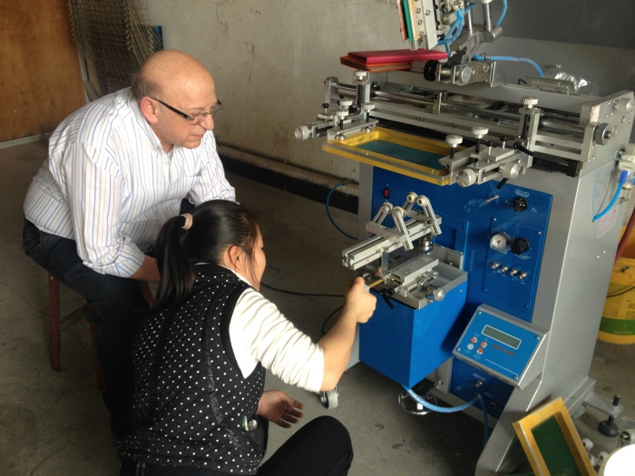 Middle East customer training on the embossing machine, curve screen printer, pad printers and digital foiling machine