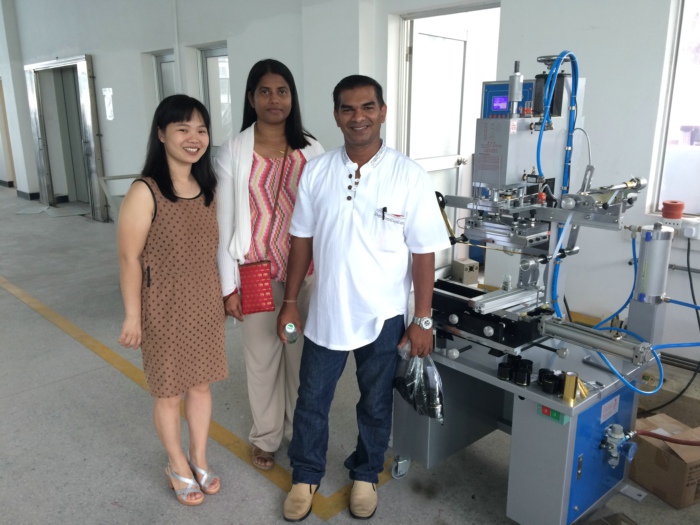 Malaysia customers visited us and took the training on the multi functional hot stamping machine model 6B for Caps