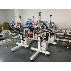 Automatic labeling head machines will be packed and delivery to European customer